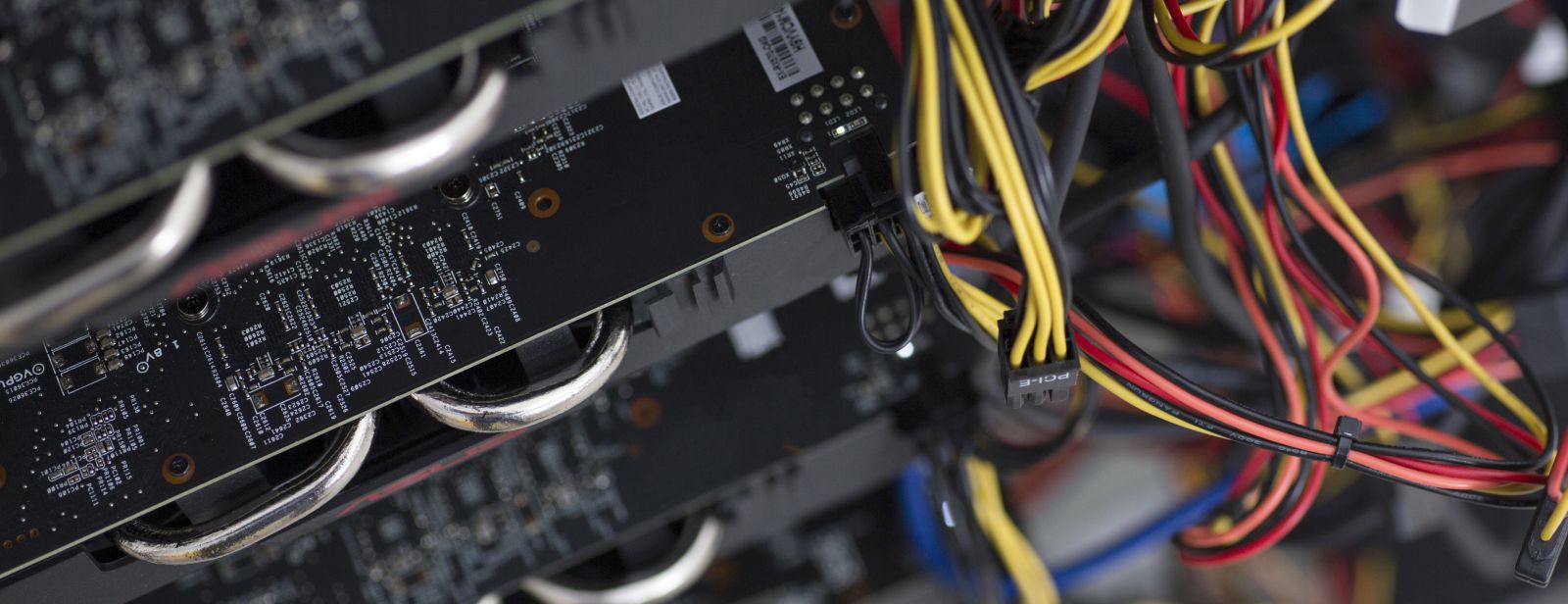 graphics cards in the cryptocurrency rig and PCI-E cables to power them